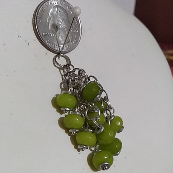 Peridot 3 strand charm necklace. - Picture 2 of 2